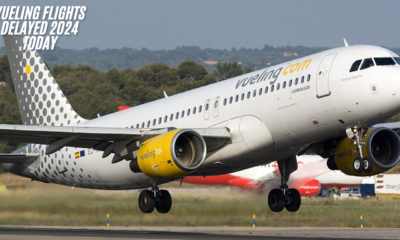 A crowded airport terminal highlighting Vueling flights delayed 2024 today.